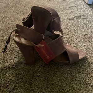 A light brown pair of heels